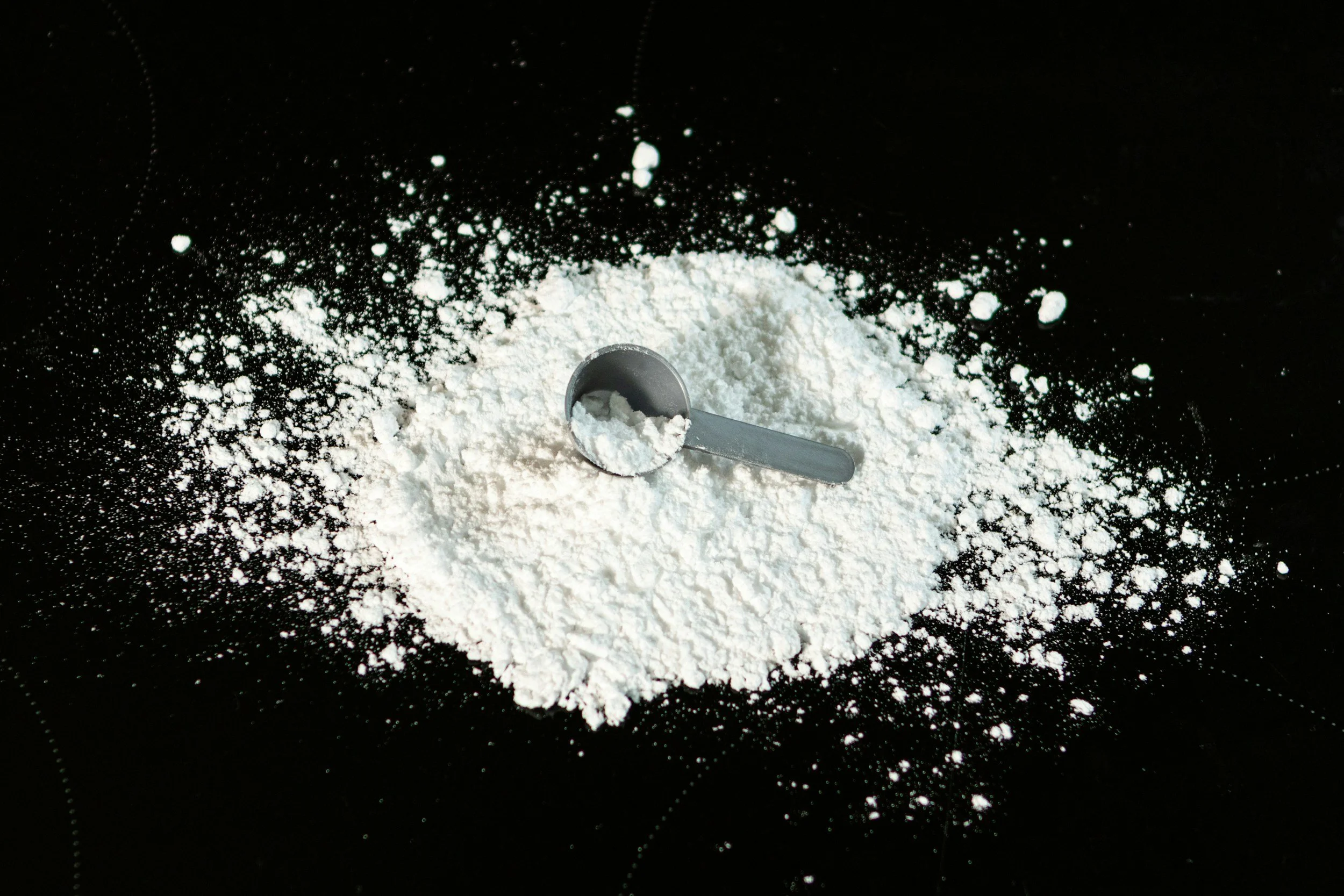 A Hybrid System of Computational Models to Predict Pharmaceutical Powder and Tablet Properties