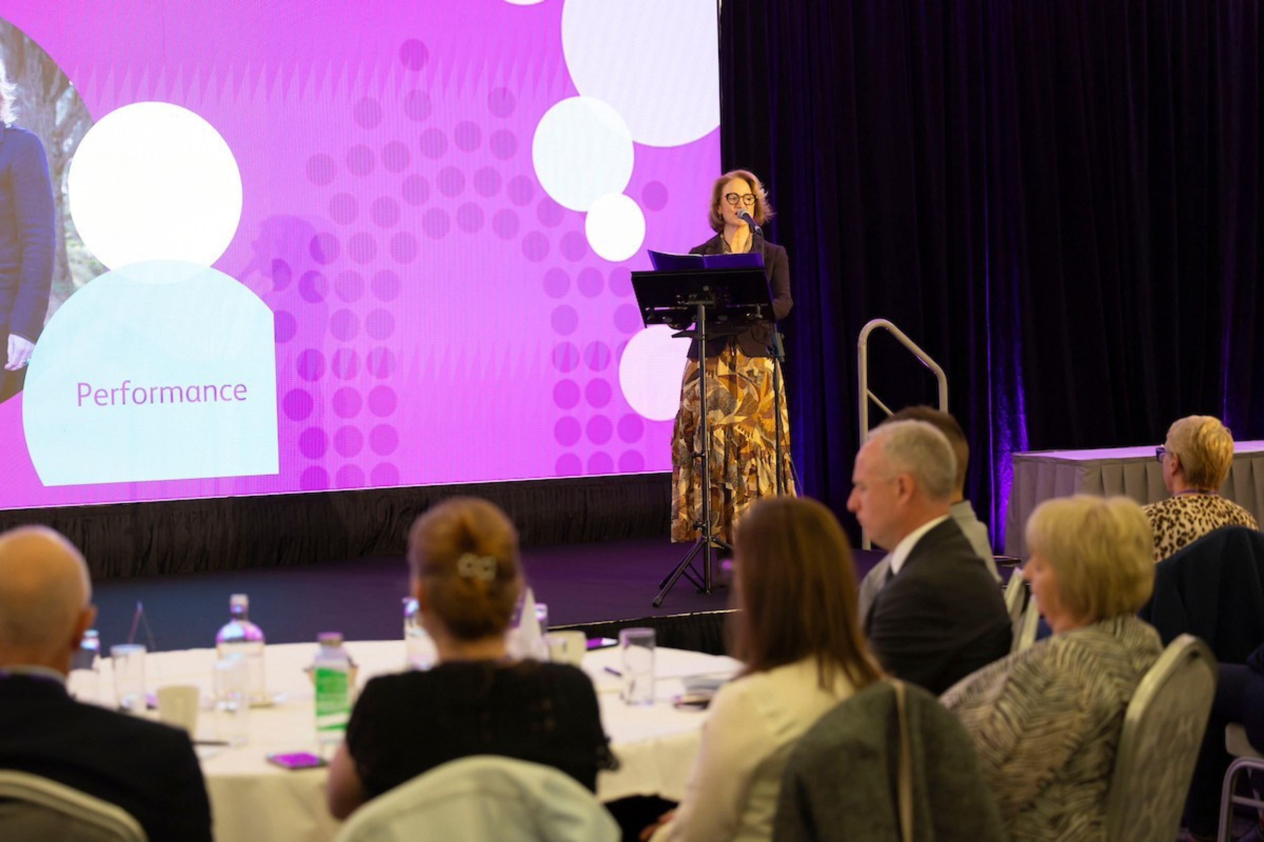 Calodagh McCumiskey delivering a corporate wellbeing keynote in Ireland