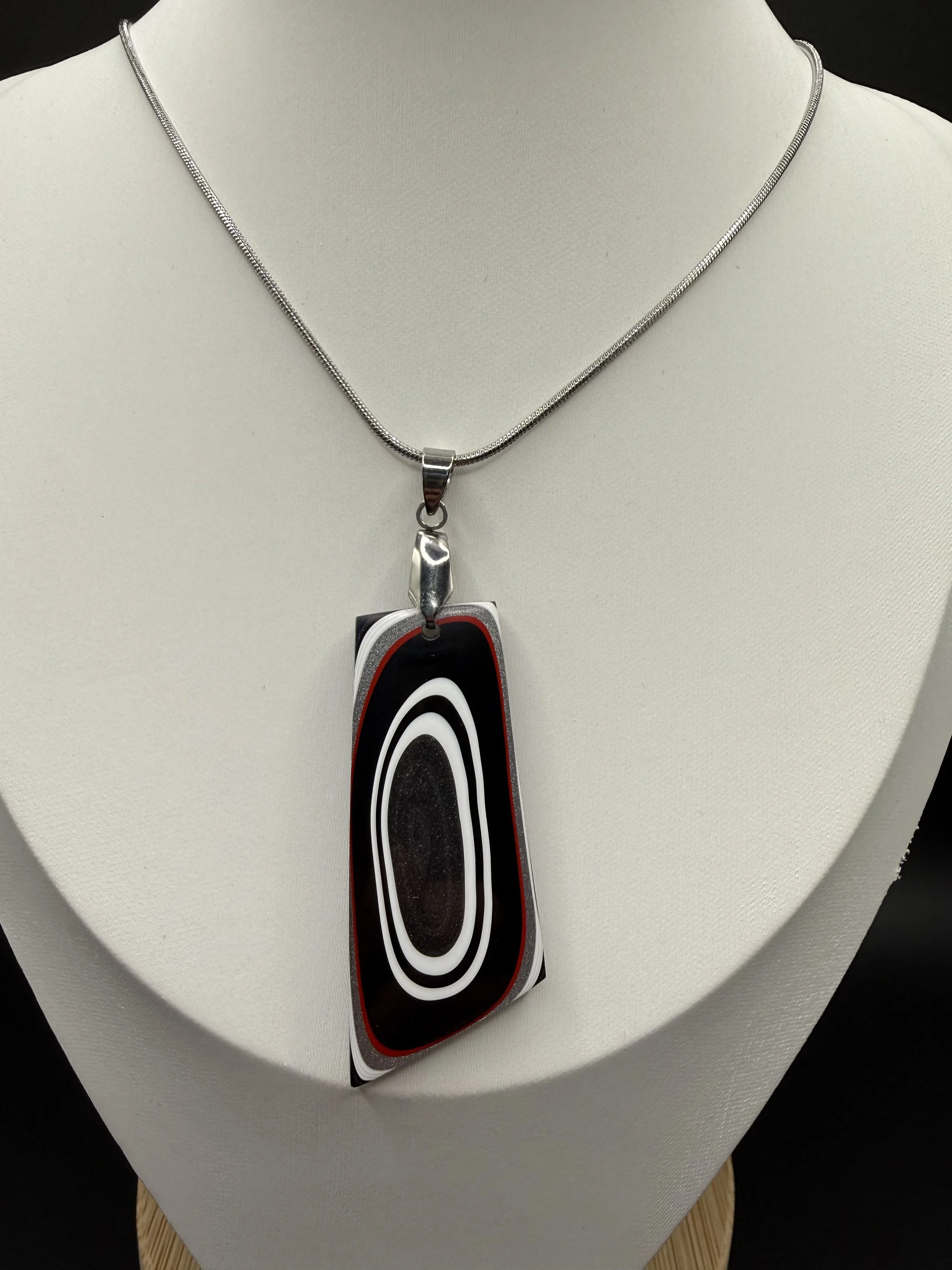 Ironclad Spirit™ Handcrafted Dodge Ram Truck Fordite Pendant Necklace.jpeg