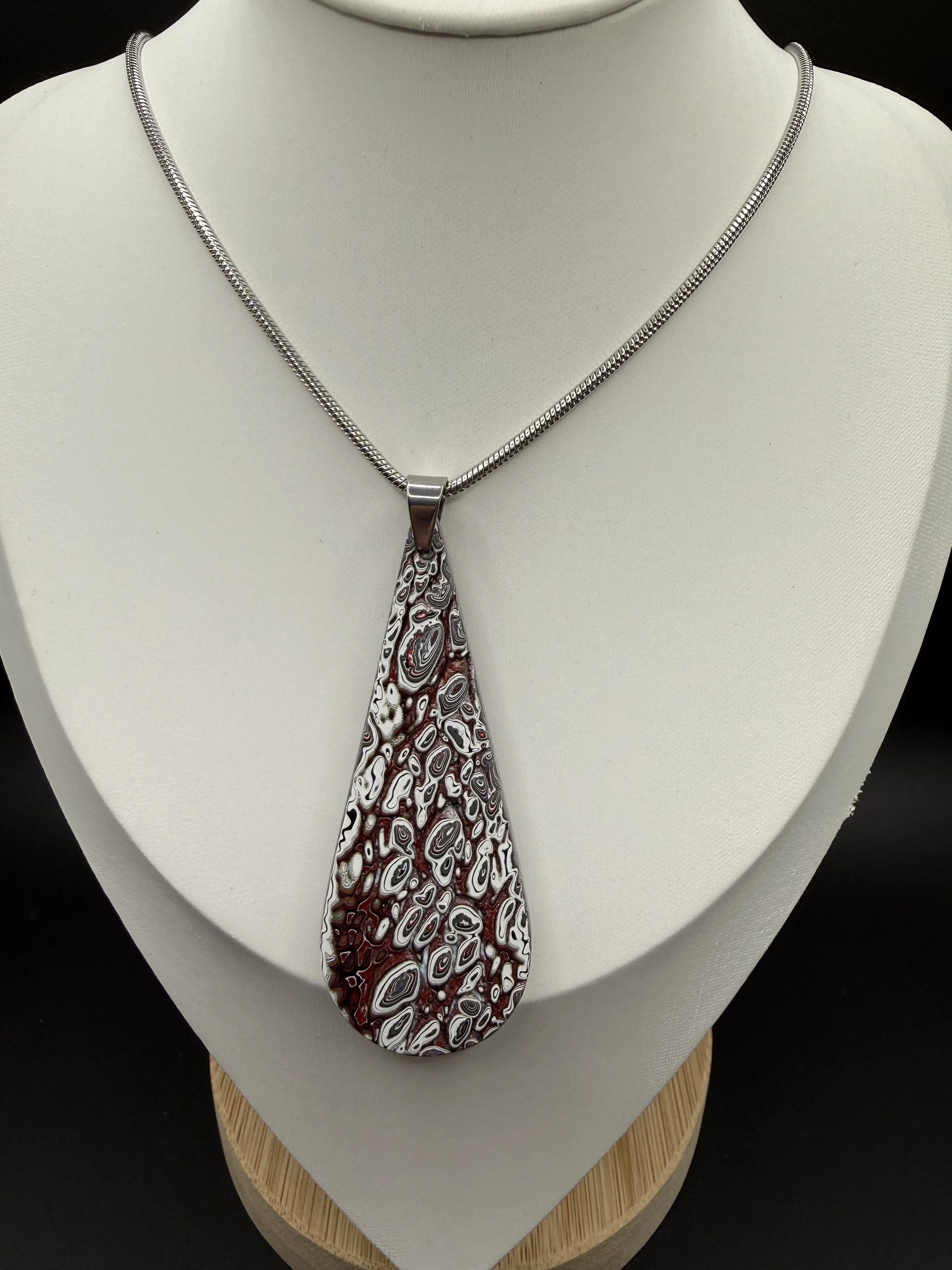 Drops of Jeepiter Handcrafted Jeep Fordite Pendant Necklace .jpeg