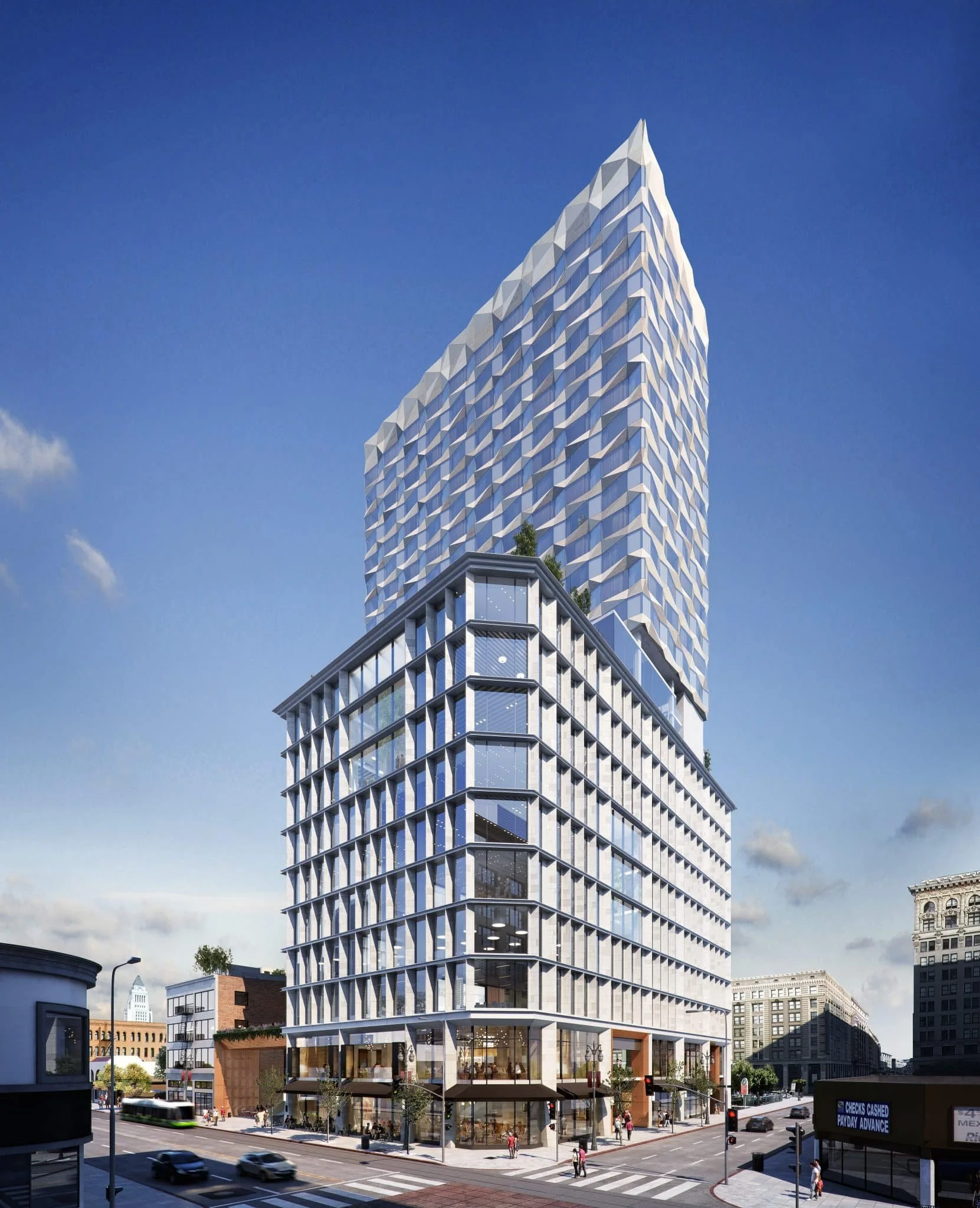 Modern high-rise building with a unique angled facade in an urban setting.