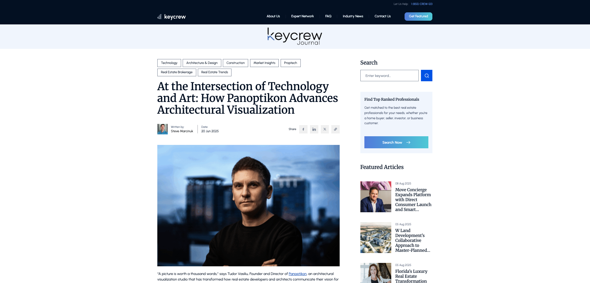 A man with short brown hair wearing a black shirt standing in front of a cityscape with tall buildings, during daytime, in an urban setting.