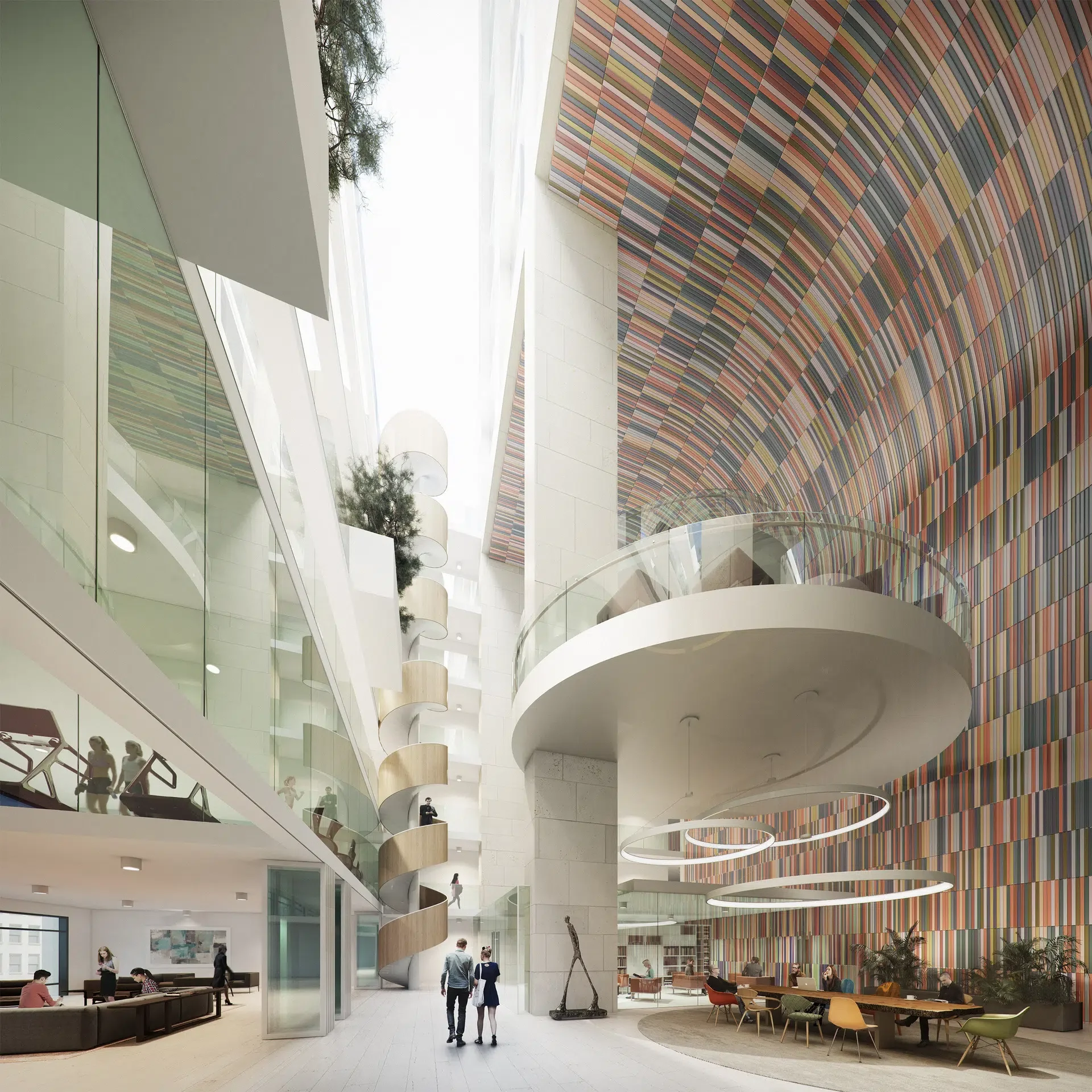 Interior view of a modern building atrium with a curved balcony, colorful striped wall, iron sculpture, and seating area.