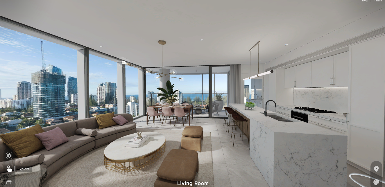 Modern living room with large floor-to-ceiling windows showing city skyline, beige sectional sofa with pillows, marble coffee table, dining area with table and pink chairs, white kitchen with bar stools, and balcony with outdoor furniture.