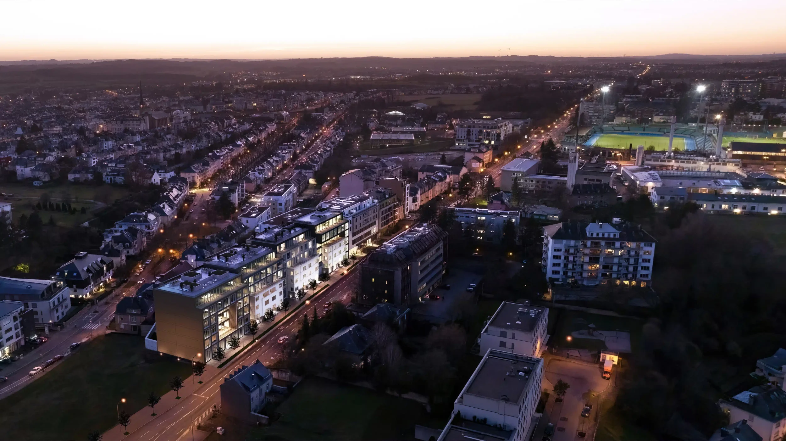 UpSide-Luxembourg-office-residential-aerial-night-©Panoptikon-scaled.webp