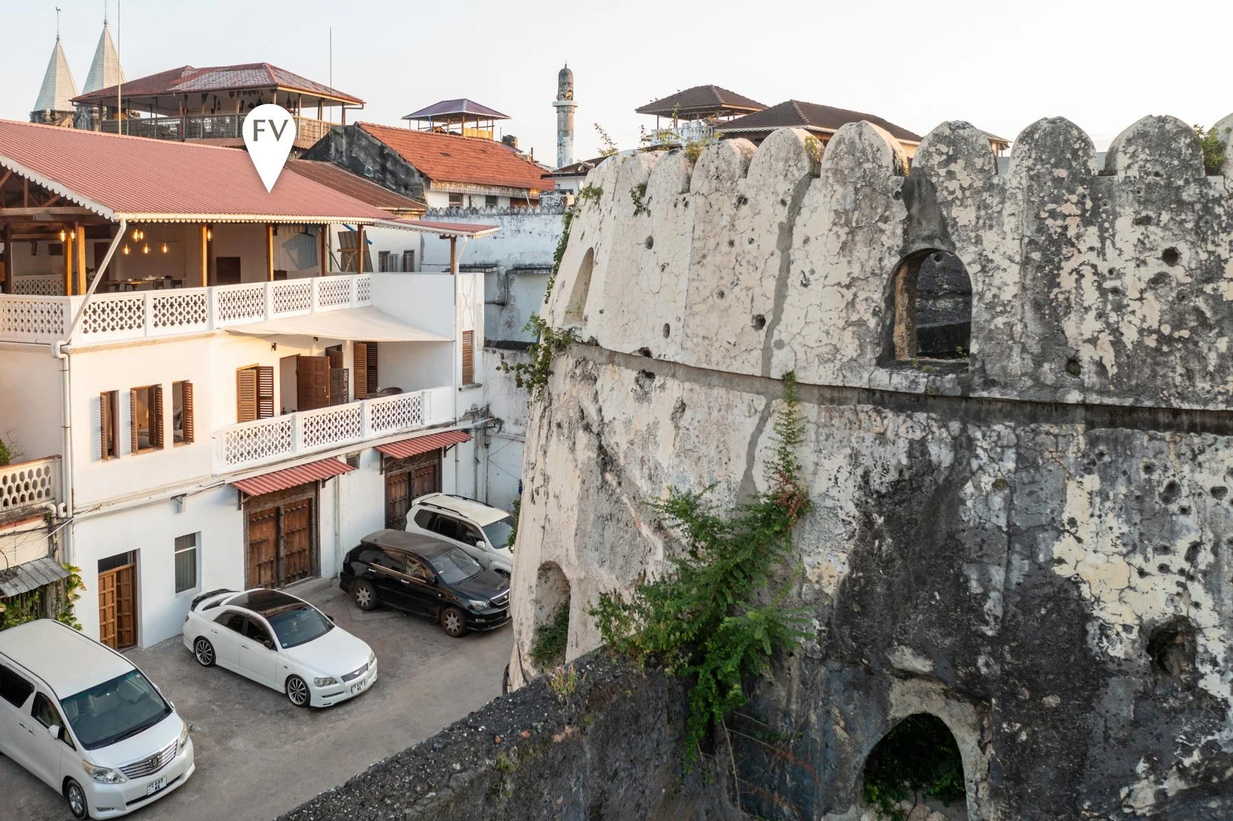 Fort View accommodation to the left and the Old Fort to the right. Stone Town, Zanzibar.