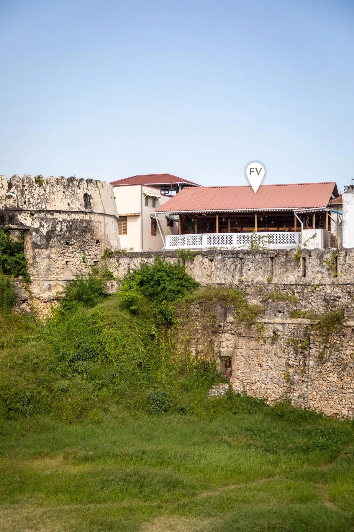 Fort View accommodation to the right and the Old Fort to the left. Stone Town, Zanzibar.