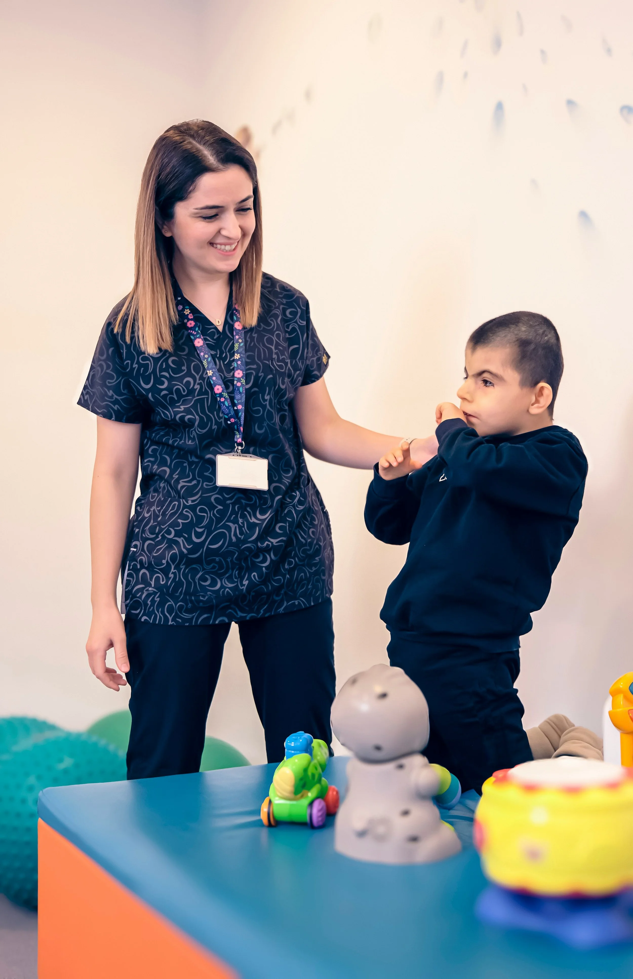Professional + child with a disability