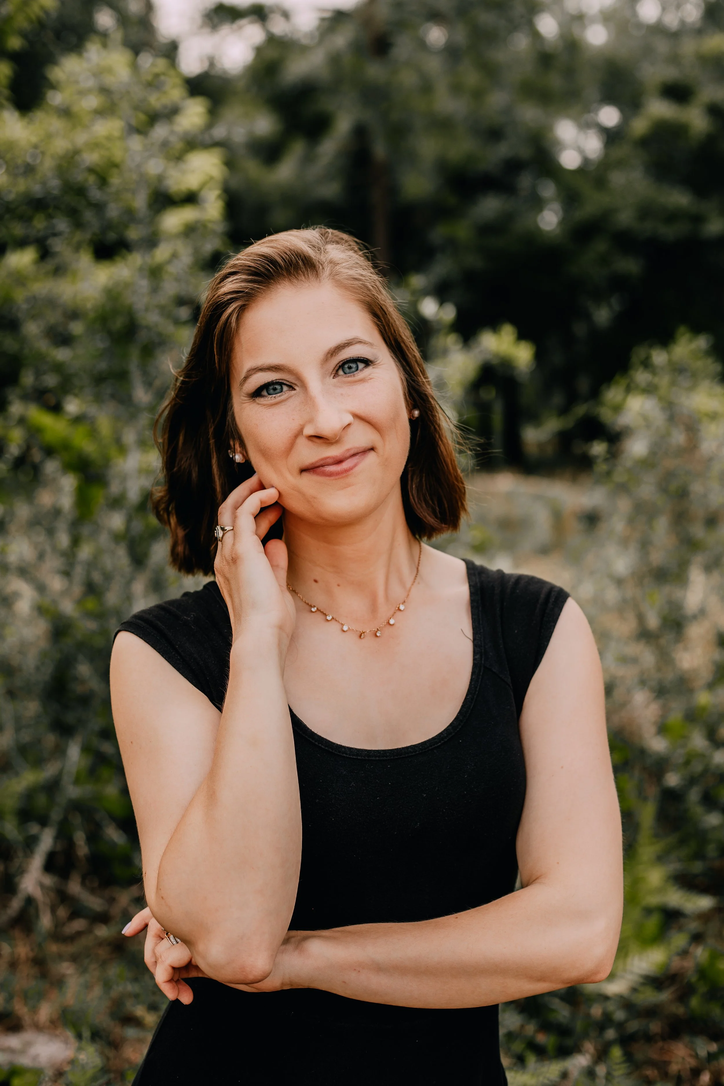 Portrait of Dani in a natural, relaxed setting