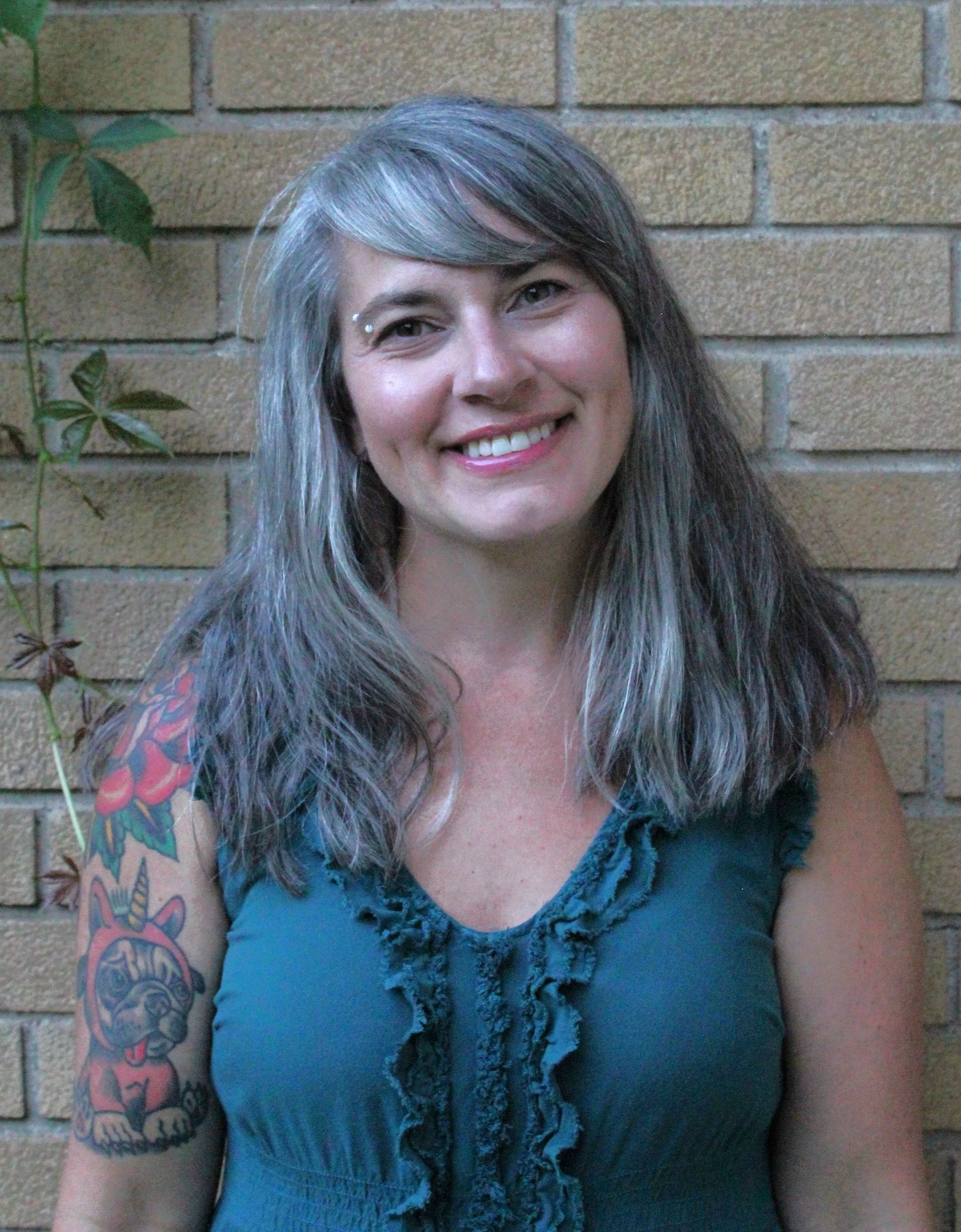 Stephanie Hillebrand LMSW CAADC therapist in Grand Rapids Michigan headshot.