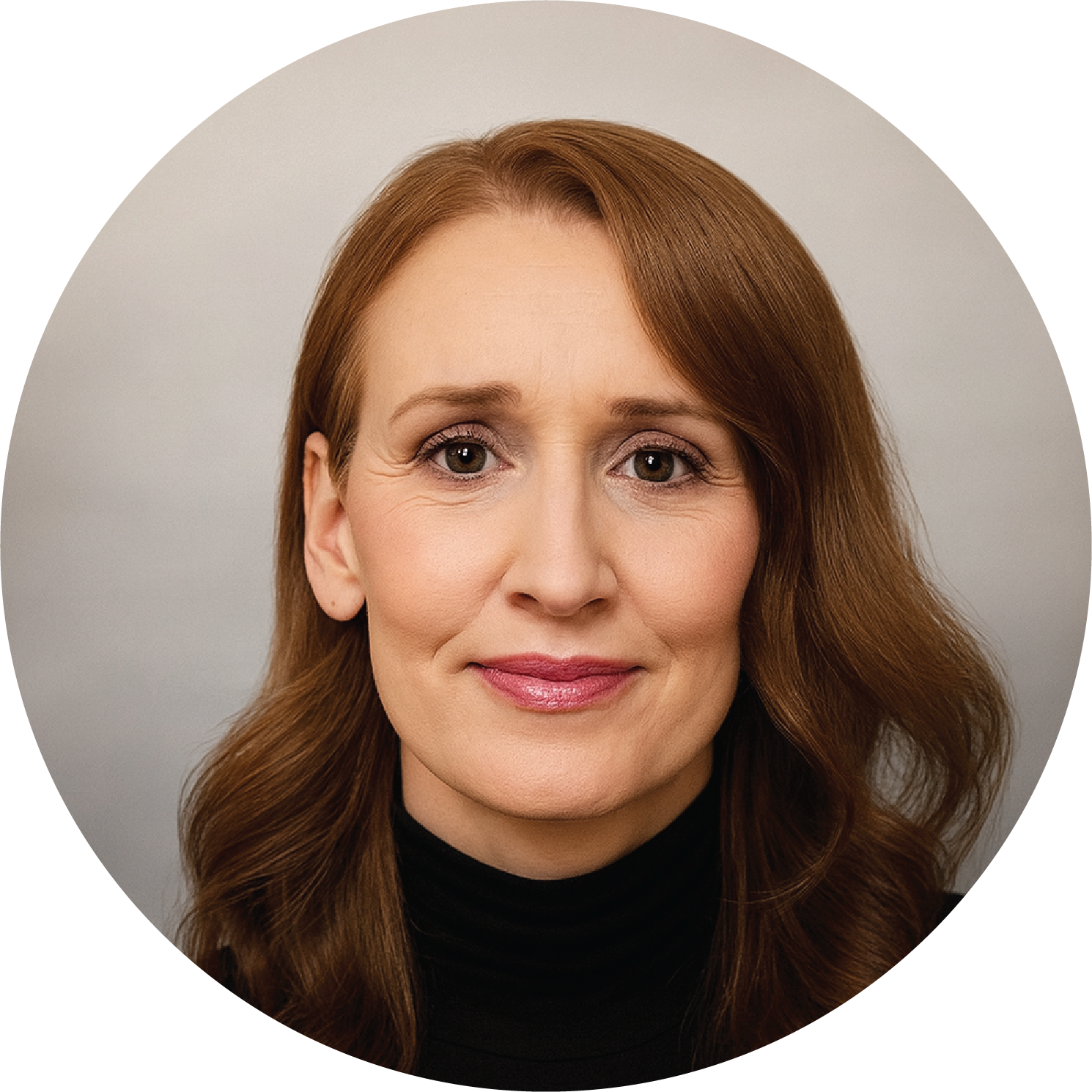A woman with shoulder-length auburn hair, wearing a black turtleneck, smiling softly against a gray background.