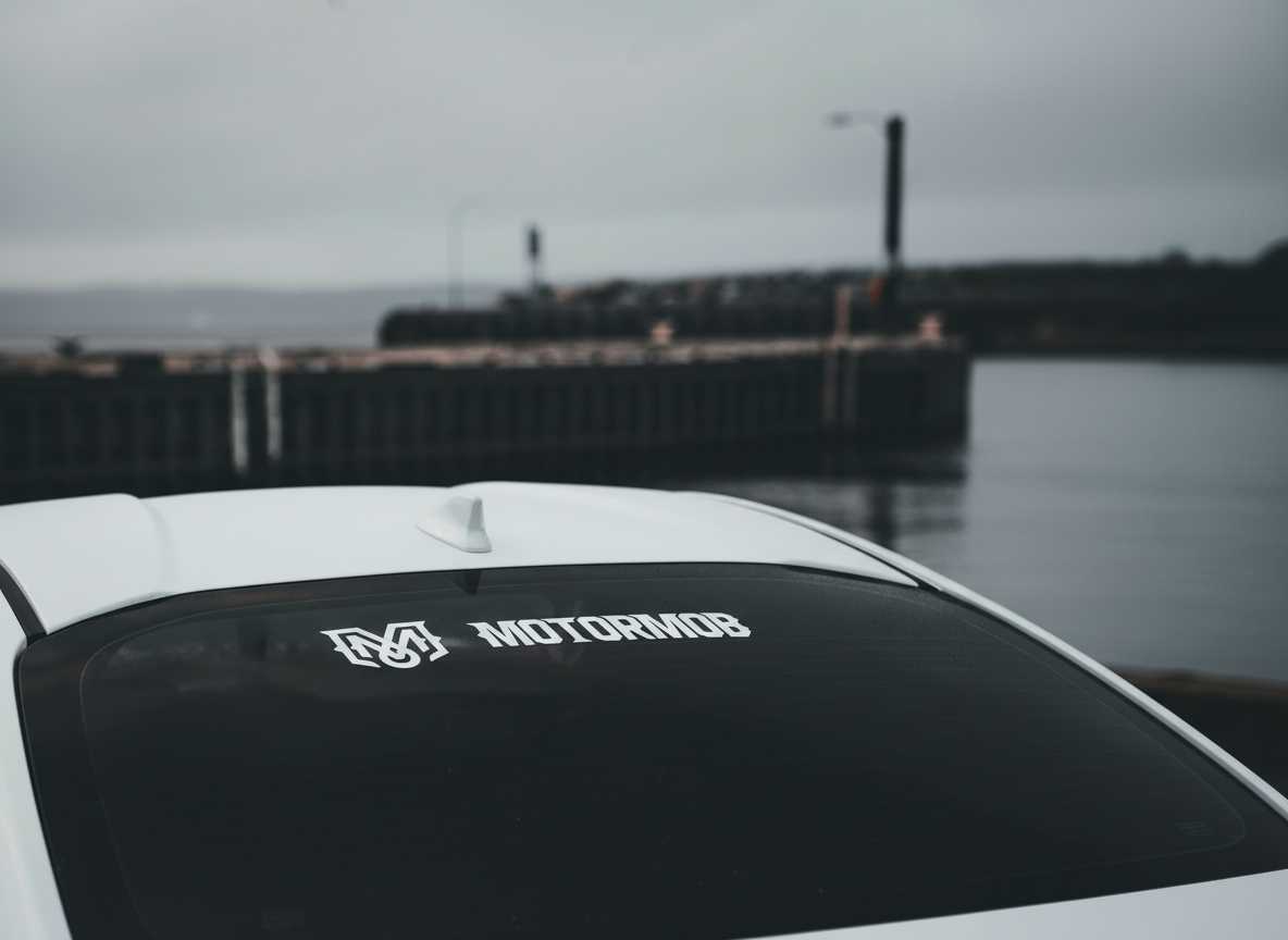 Firefly_Gemini Flash_replace the decal on the car with a white version of this logo 411899.png