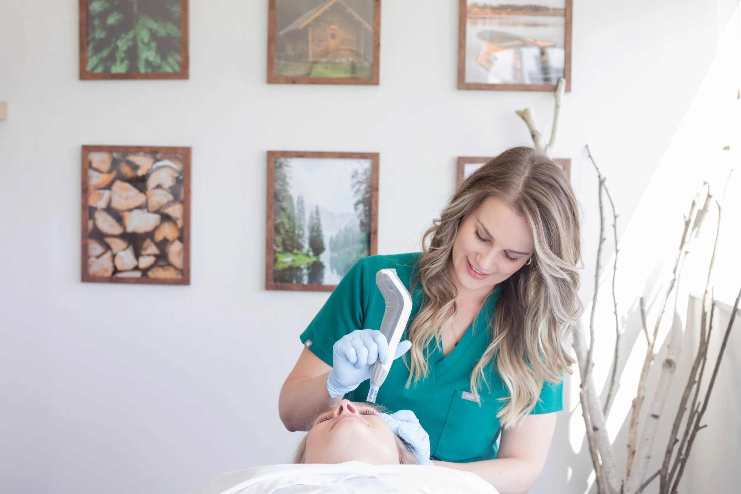 Woman receiving microneedling treatment with facial skincare care in a calm setting in Bloor West Village, representing spring skin refresh, glow, and natural collagen support.