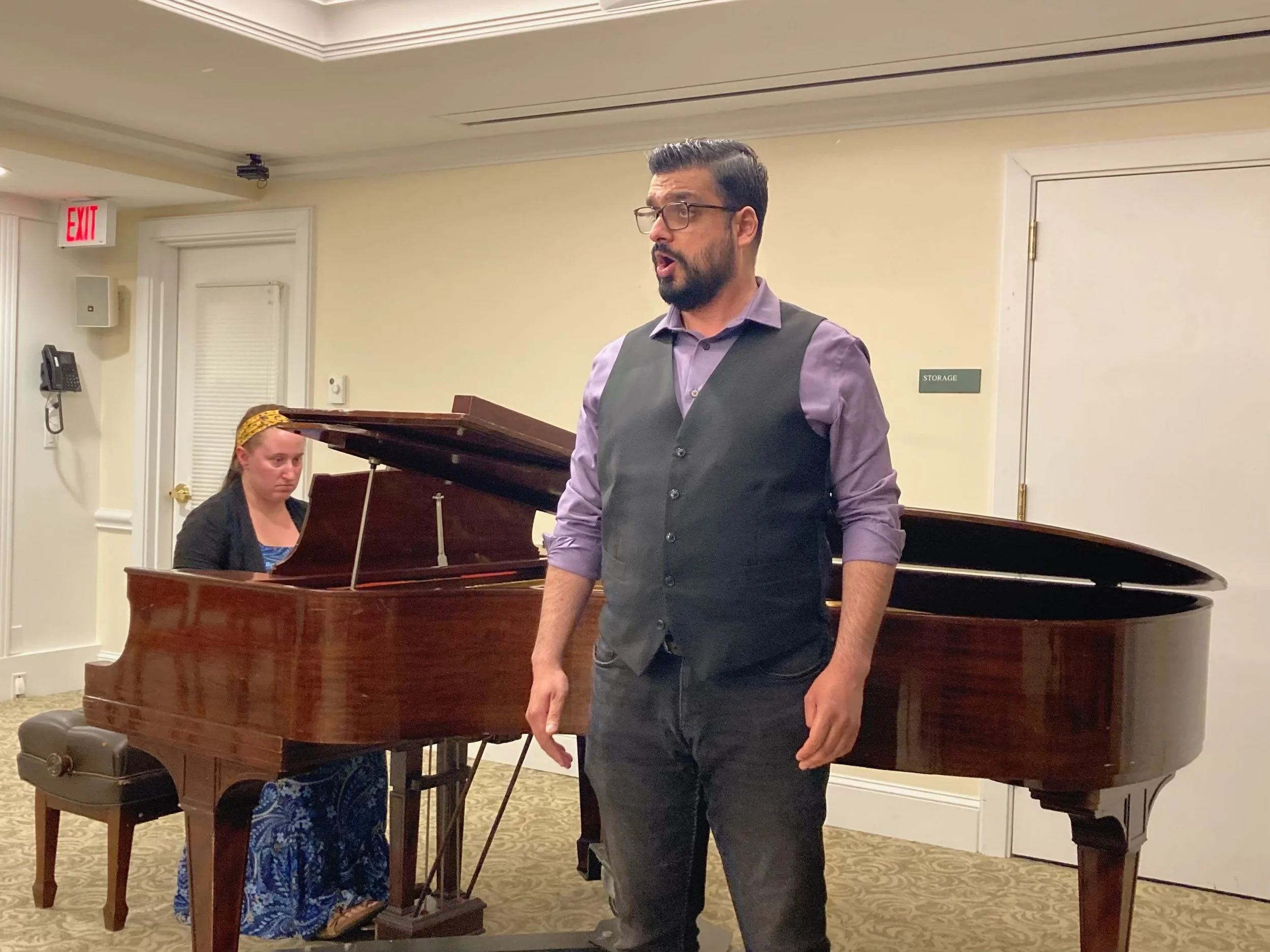 Kartik Ayysola and pianist Maria Rabbia performing at Lasell Village