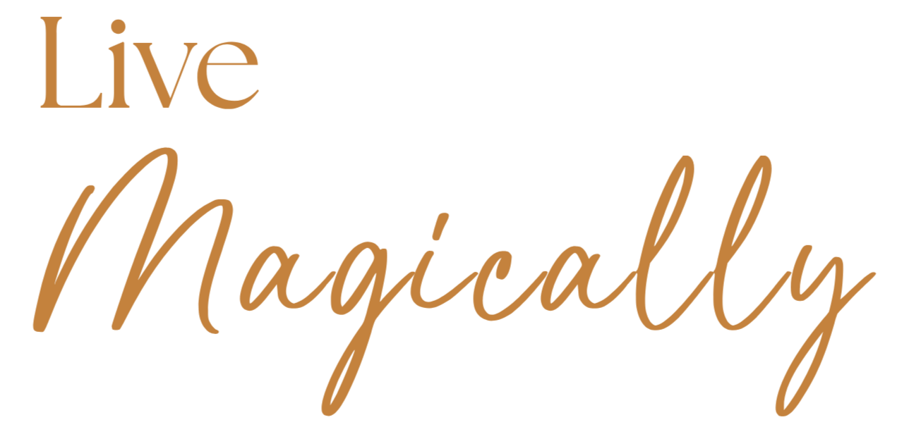 The image features text that says 'Live Magically' with a stylish font, with 'Live' in a bold, serif font and 'Magically' in a cursive font, both in shades of brown on a transparent background.