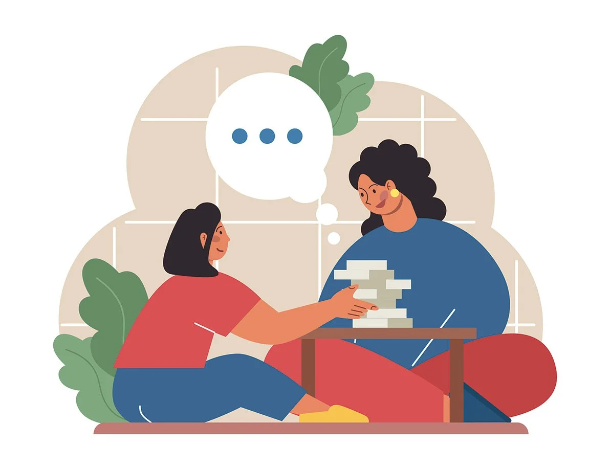 Illustration of a child or young person and a woman sitting on the floor playing a game at a small table, with a speech bubble above indicating conversation, surrounded by plants in a cosy setting.