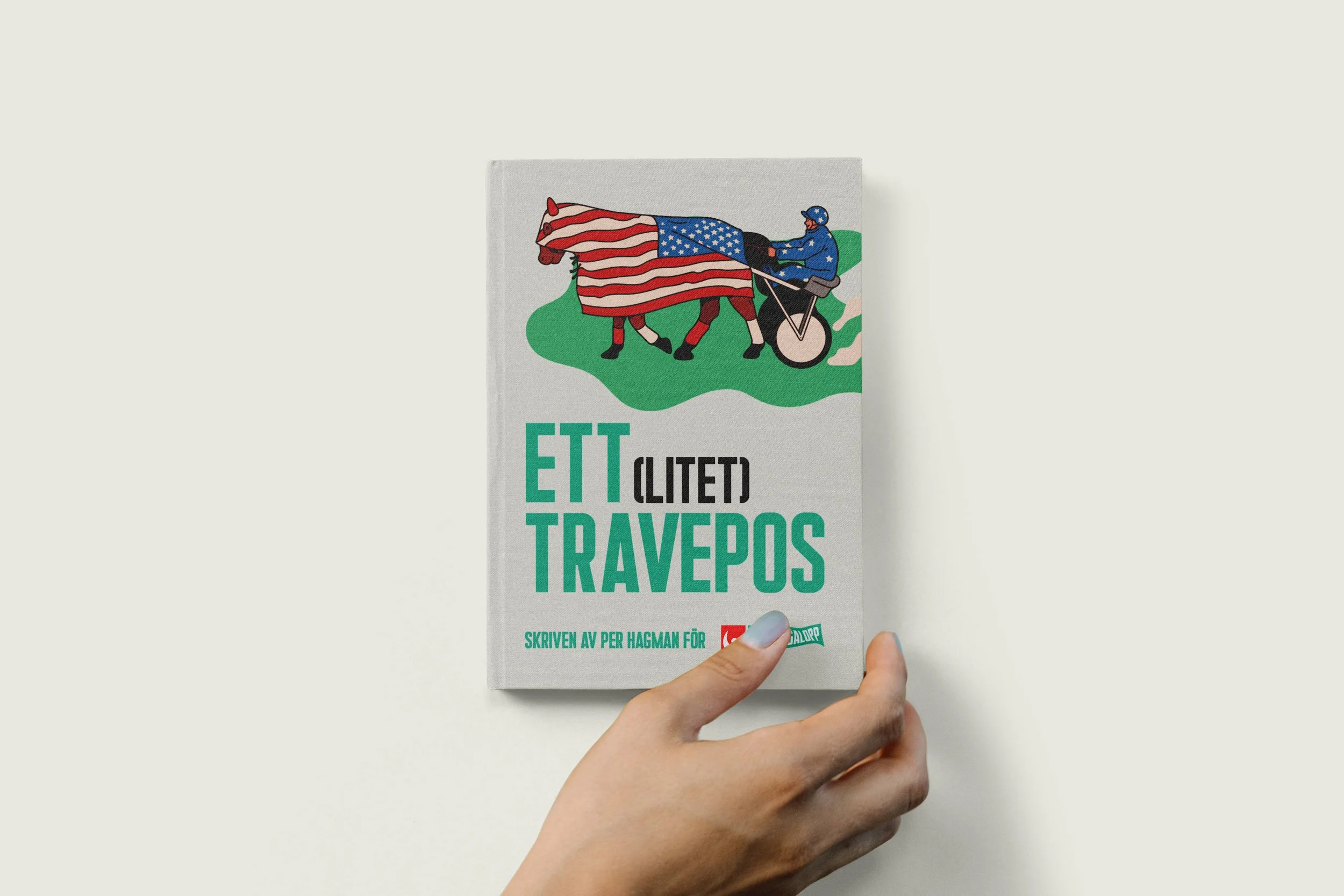Hard Cover Book with Hand Mockup.jpg