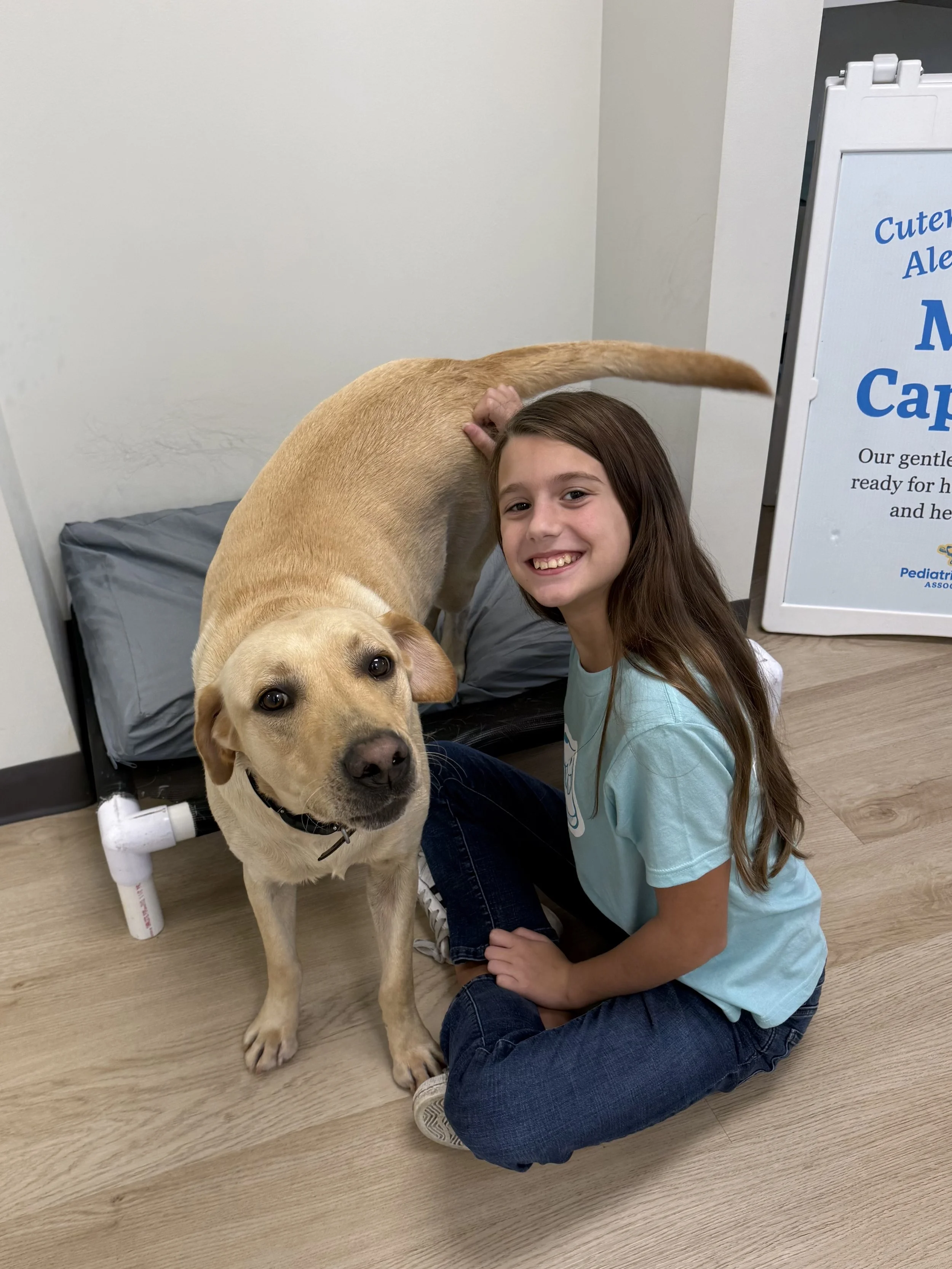 Girl patient with Captain the dog