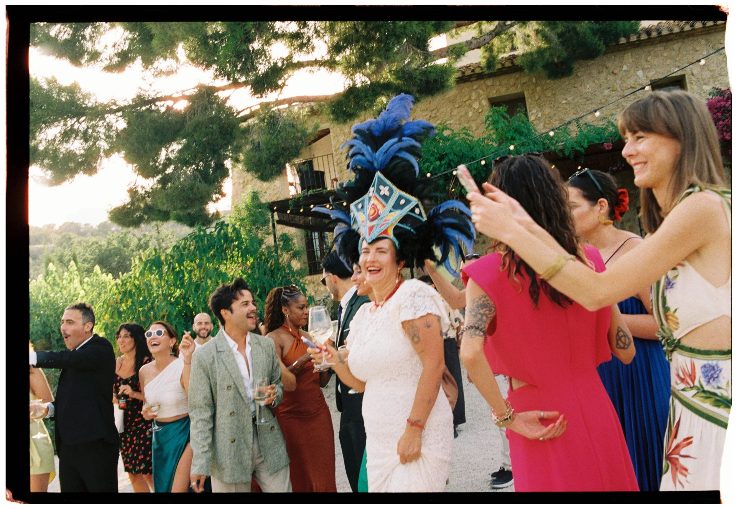 Guests celebrating and dancing during cocktail hour at a Spain wedding.