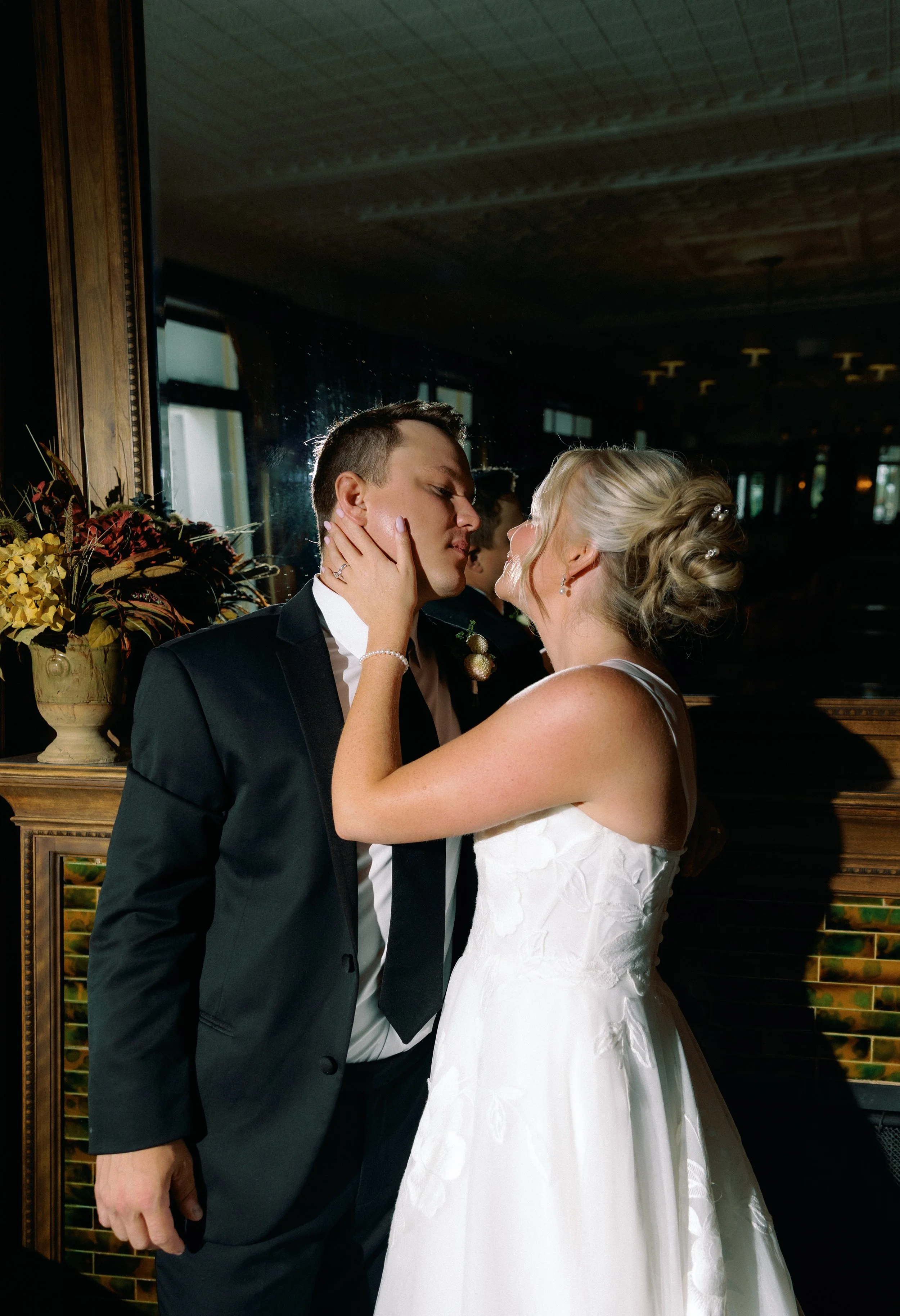 An intimate portrait of the bride and groom looking at each other