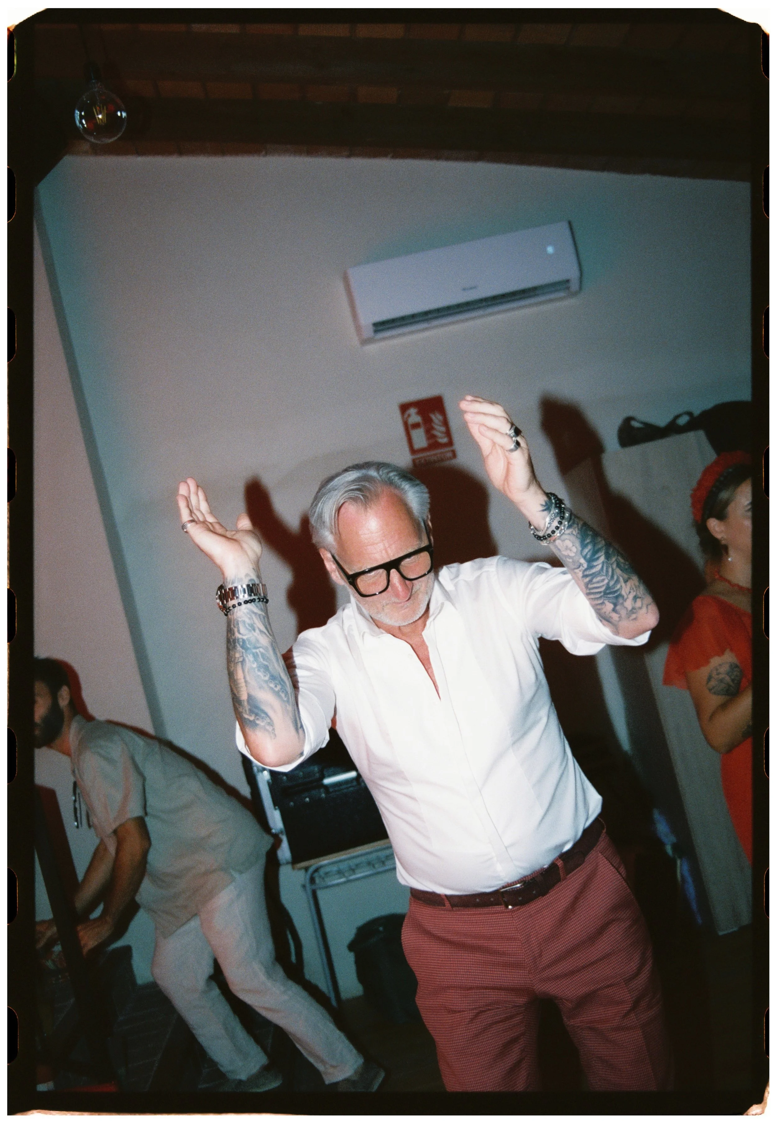 Wedding guest dancing during the reception celebration.