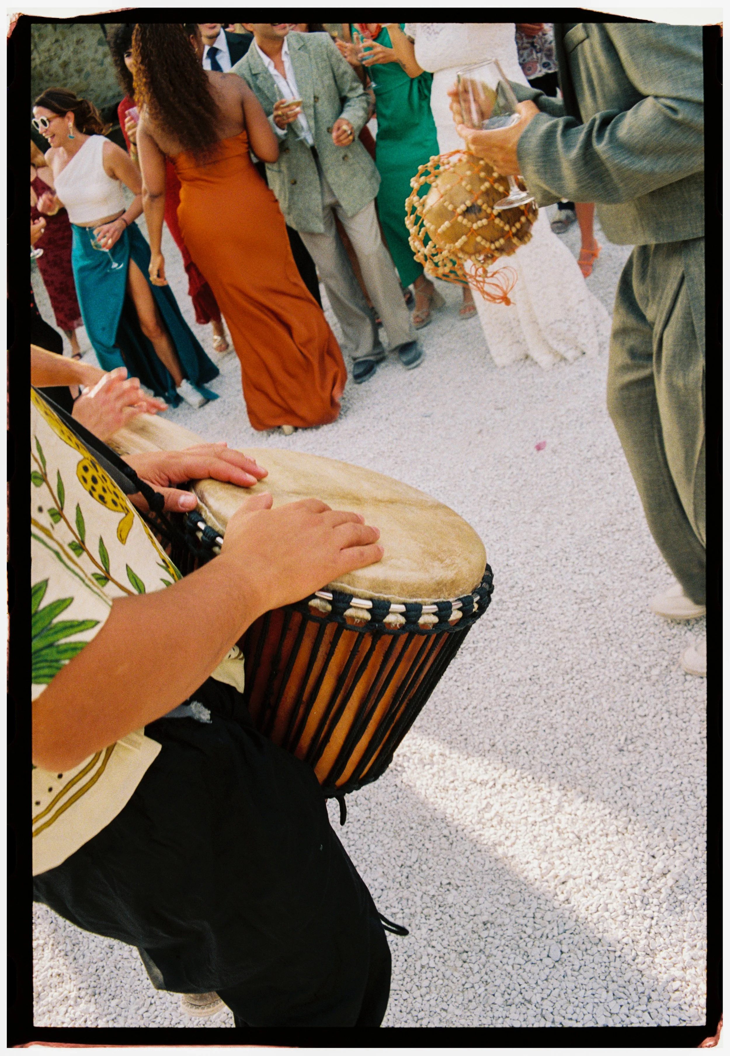 Live percussion musician playing drums during the Spain wedding cocktail hour.