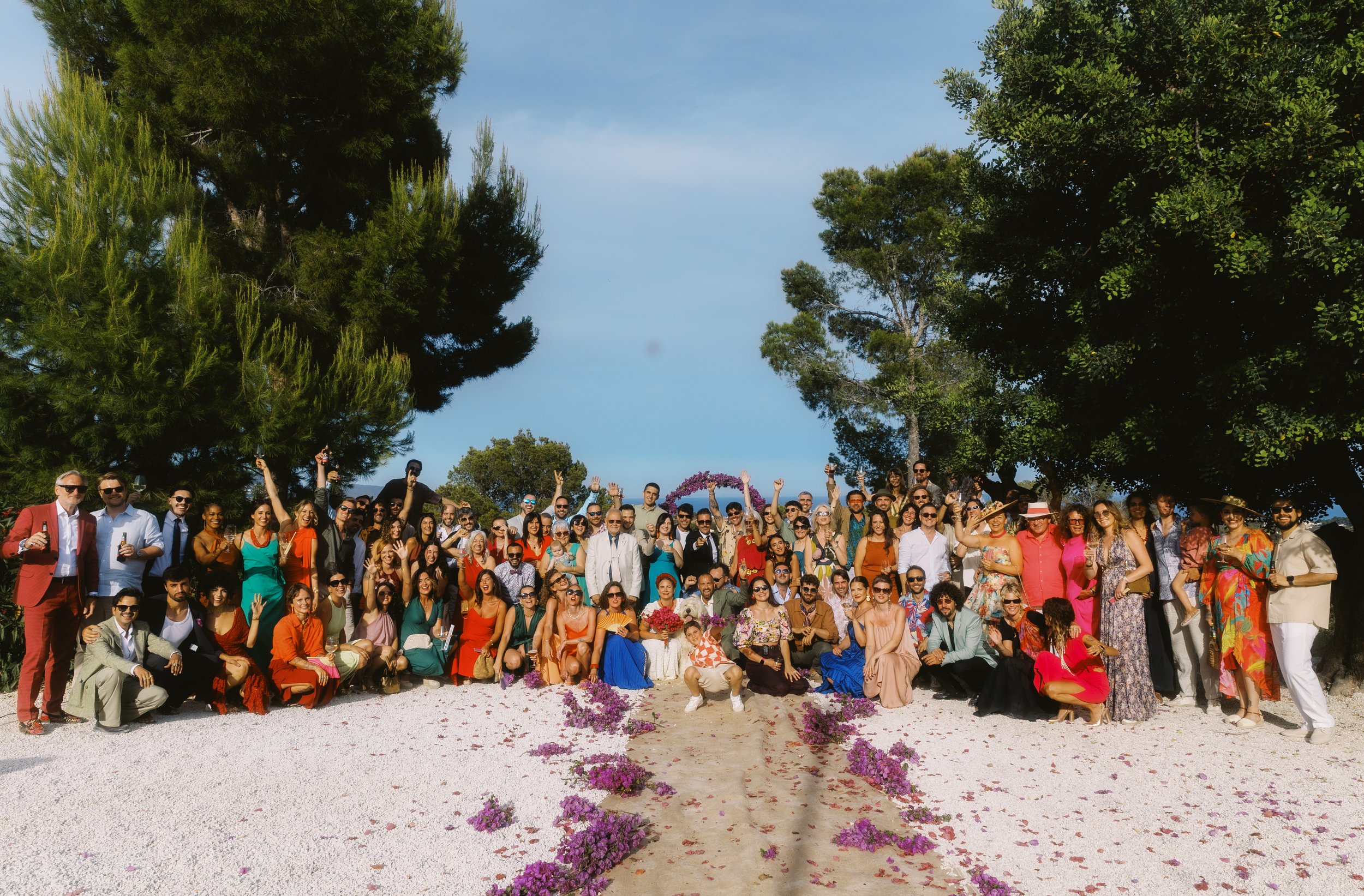 Wedding guests gathered for a group portrait after the Spain wedding ceremony.