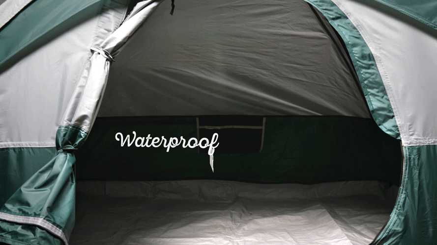 Interior of a waterproof camping tent with a black mesh window