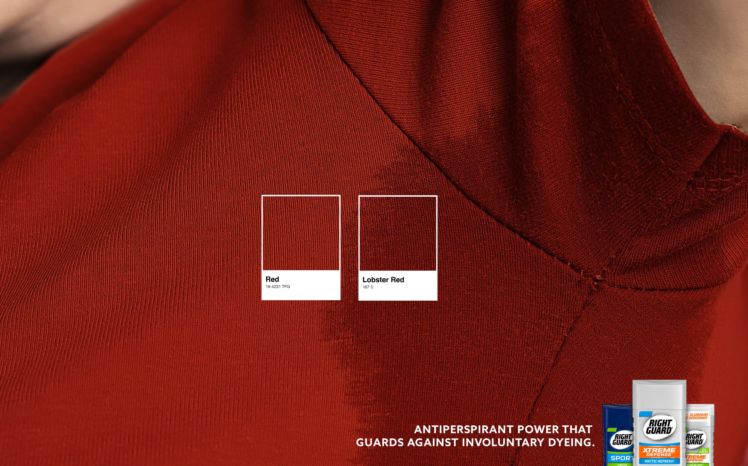 Close-up of a red fabric with color comparison cards for Red and Lobster Red shades, and a partial view of deodorant products at the bottom right corner. The text states: "ANTIPERSPIRANT POWER THAT GUARDS AGAINST INVOLUNTARY DYEING."