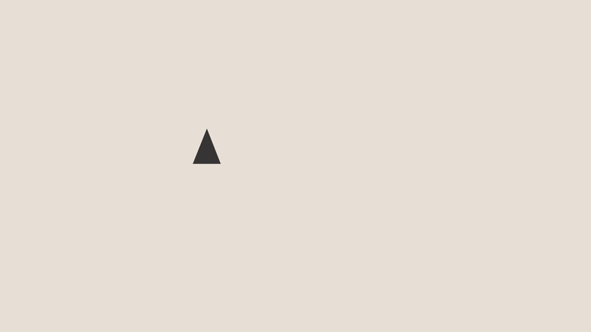 A small black right-facing triangle on a light beige background.