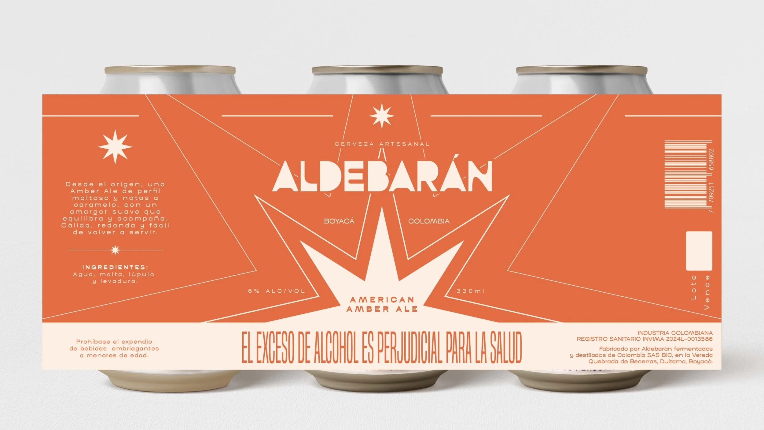 Three cans of Aldebarán craft beer with orange label and geometric design, containing Colombian amber ale with 6% alcohol, 330ml, and labeling about ingredients and health warning.