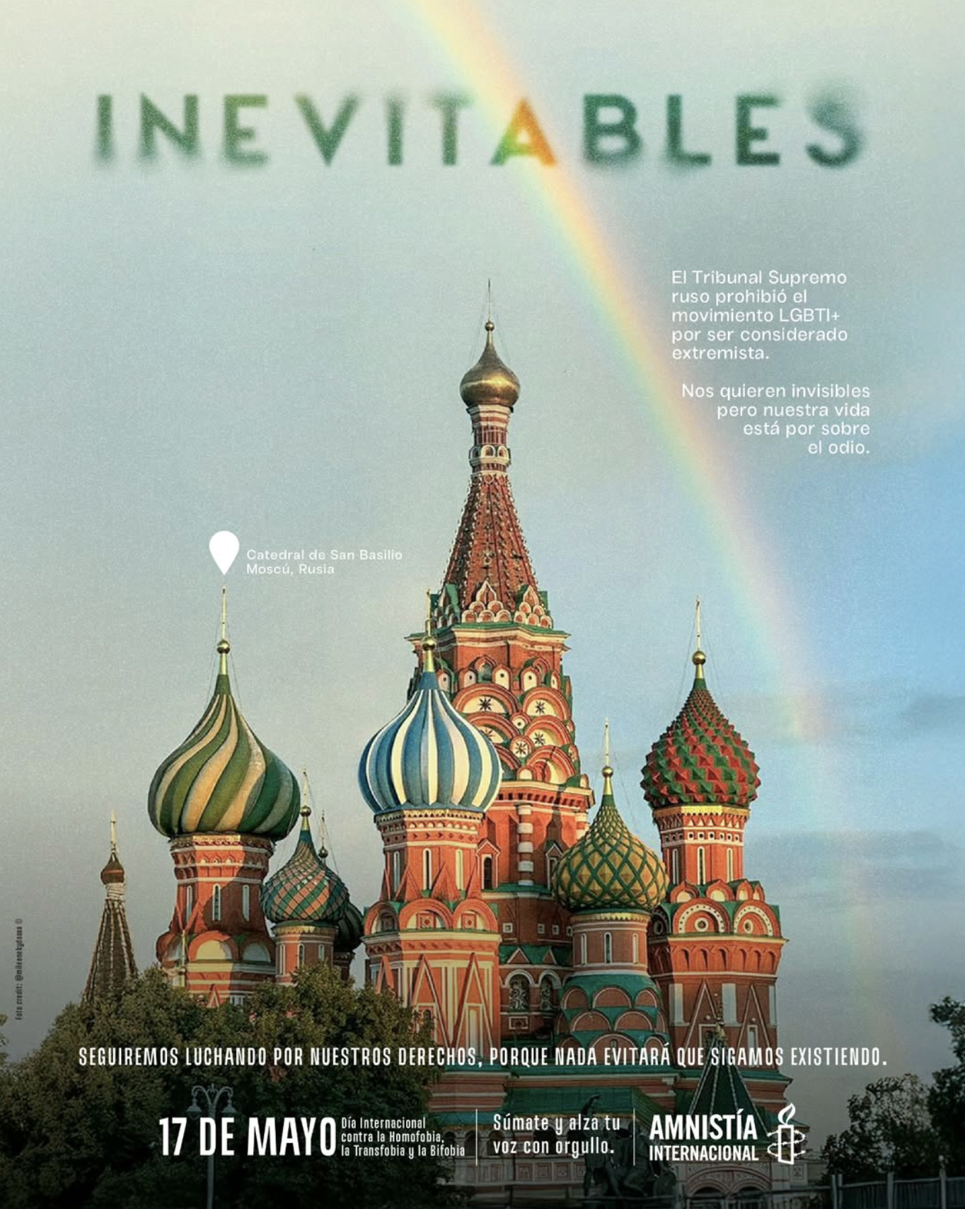 Colorful St. Basil's Cathedral in Moscow with a rainbow in the sky.