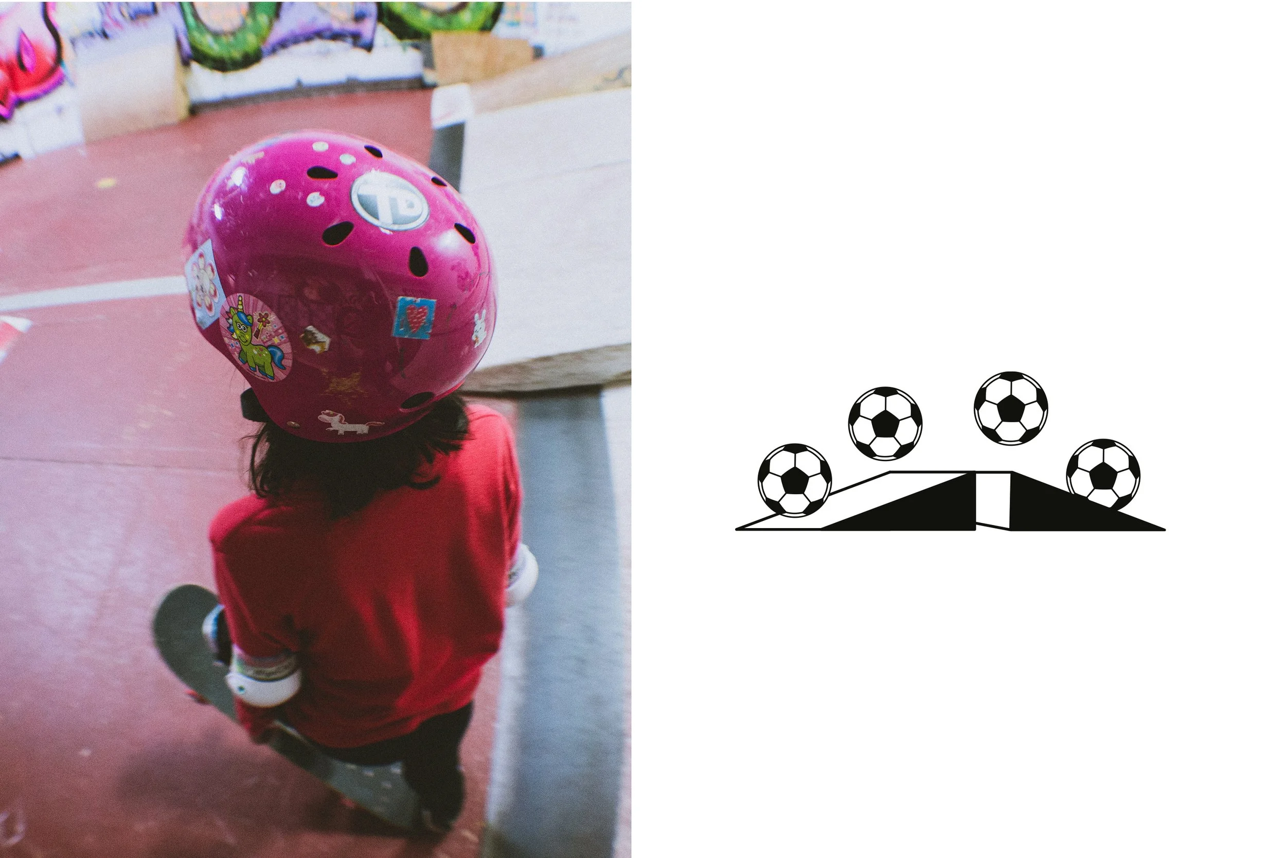 A young girl wearing a pink helmet decorated with stickers, sitting on a skateboard at an indoor skate park.