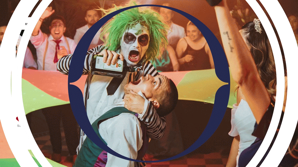 A clown with green hair and face paint intimidating a boy at a party, while a girl looks on.