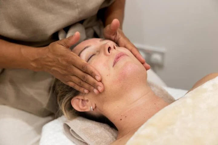 Natasha giving a face massage