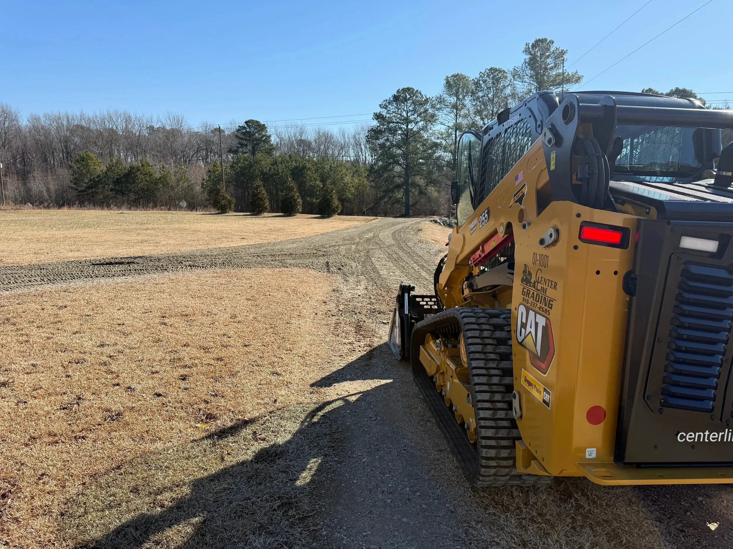 Cat CTL skid steer gravel driveway 255 ABC STONE Gravel Driveway regrading driveway install experts