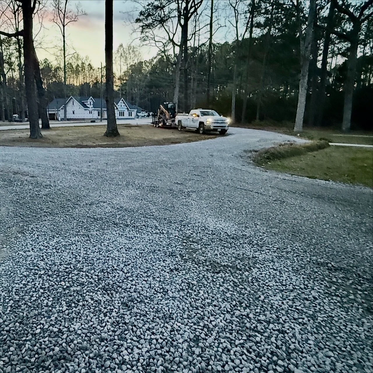 Gravel Driveway with Stone Installation regrading leveling sloping drainage 