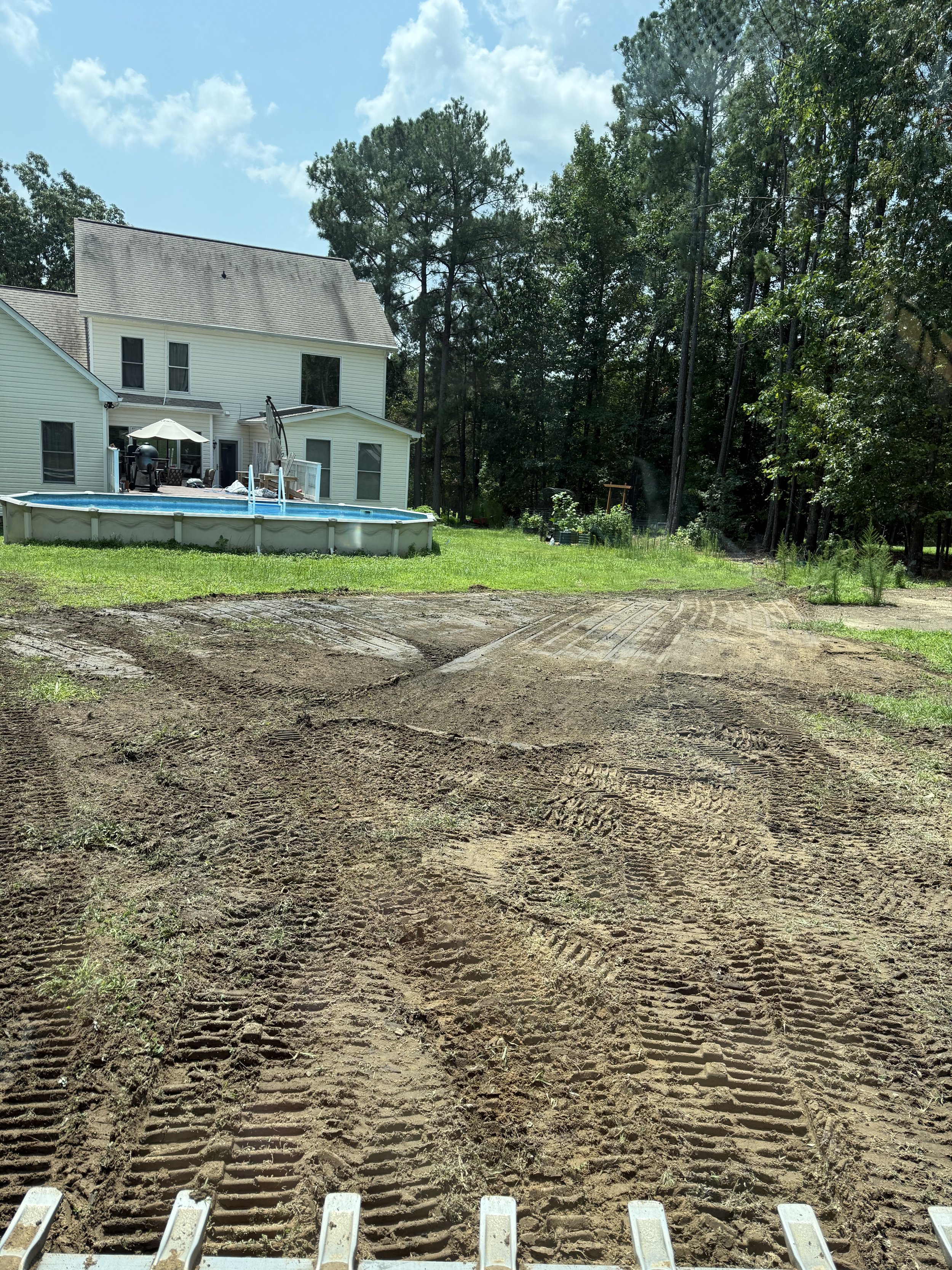 Re sloping yard for drainage