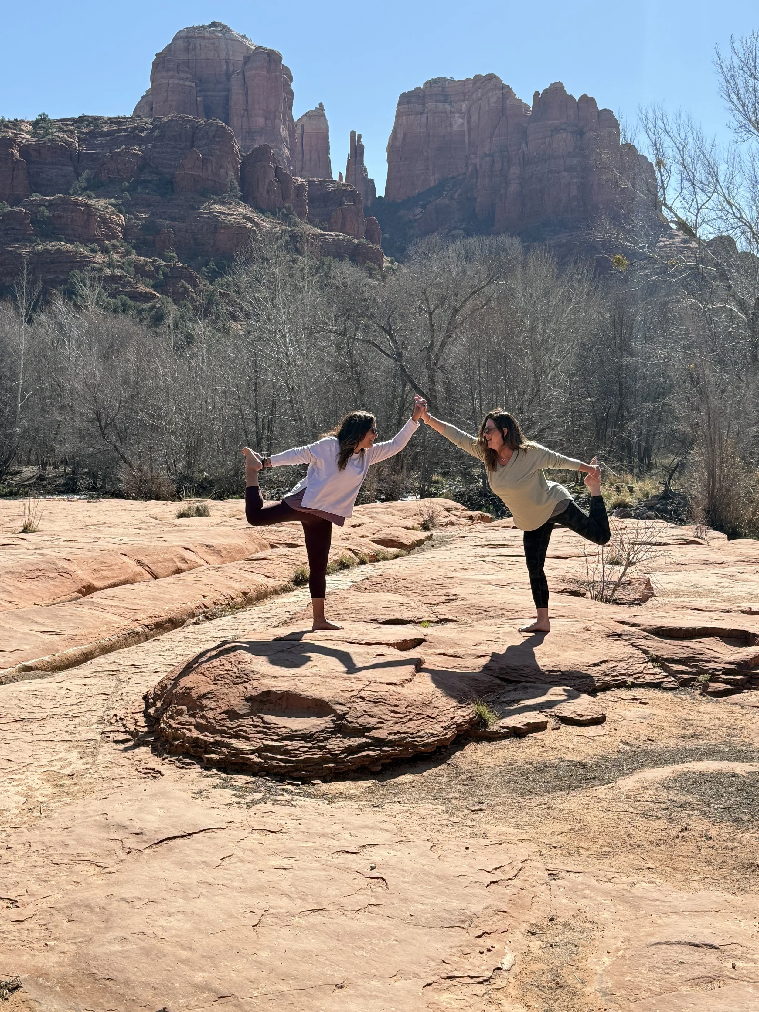 Hiba and collaborator posing in front of Sedona formations.