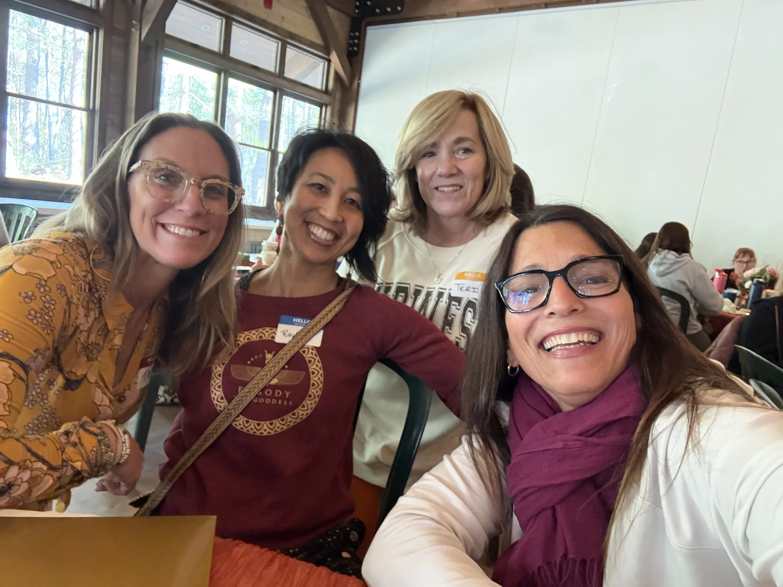 Hiba (in front white shirt with pink scarf) with, left to right, Tara Gush, Raylen Williams, and Teri Cecil.