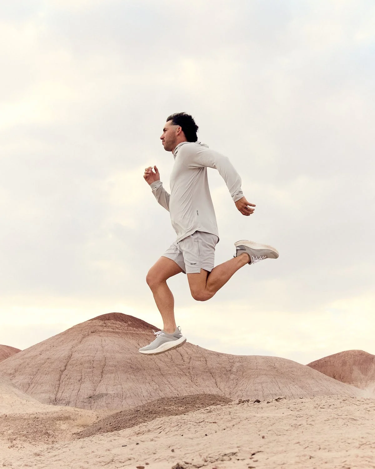 Commercial shot of athlete jumping in Sedona and training