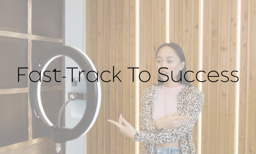 A woman recording herself in front of a ring light with the text 'Fast-Track To Success' overlaid.