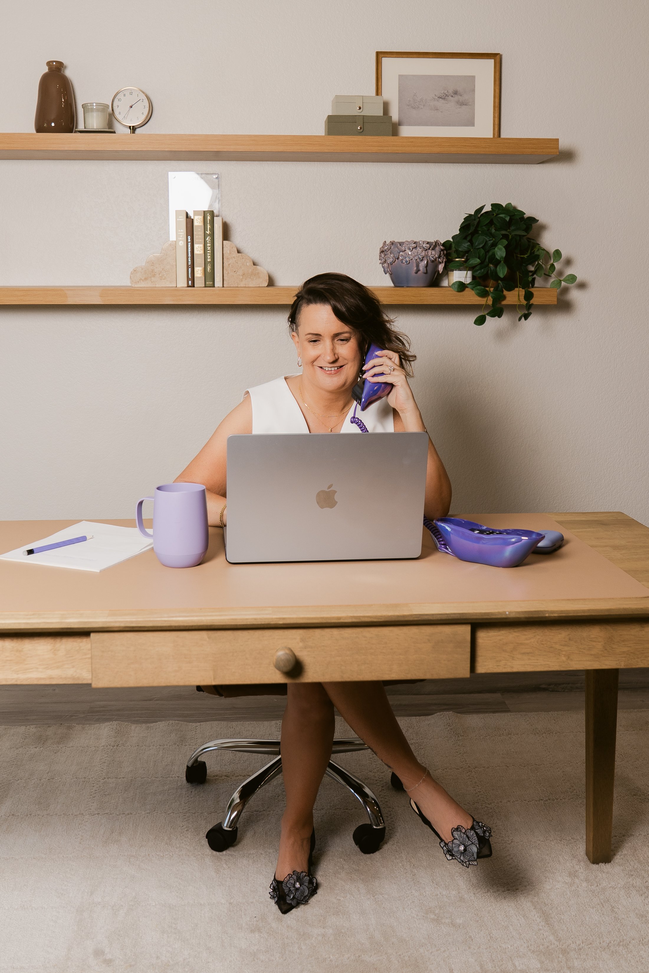 Kim Ast At Desk On Phone