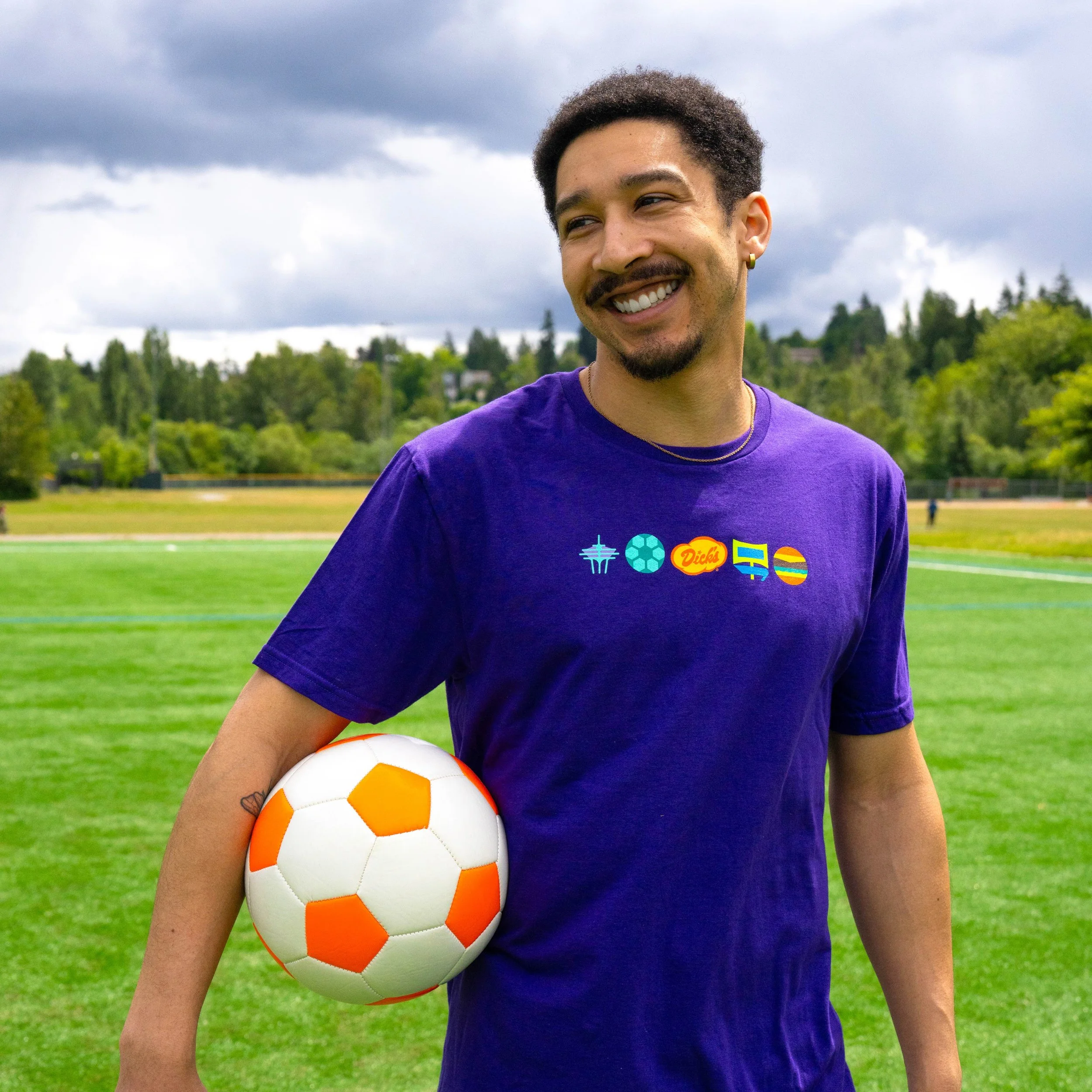 Party_on_the_Pitch_T-Shirt-Purple-Lifestyle-Front-1x1.jpg