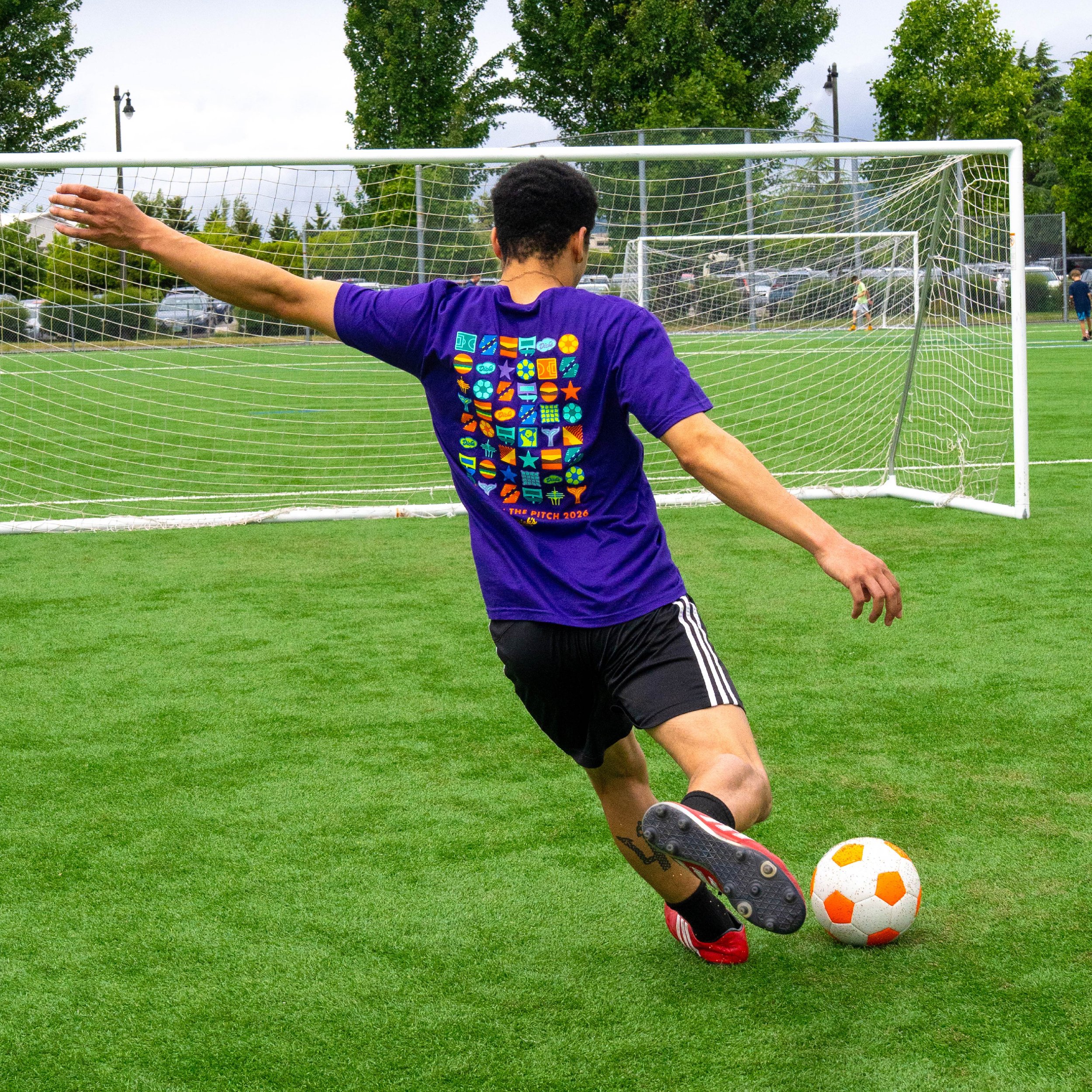 Party_on_the_Pitch_T-Shirt-Purple-Lifestyle-Back-1x1.jpg