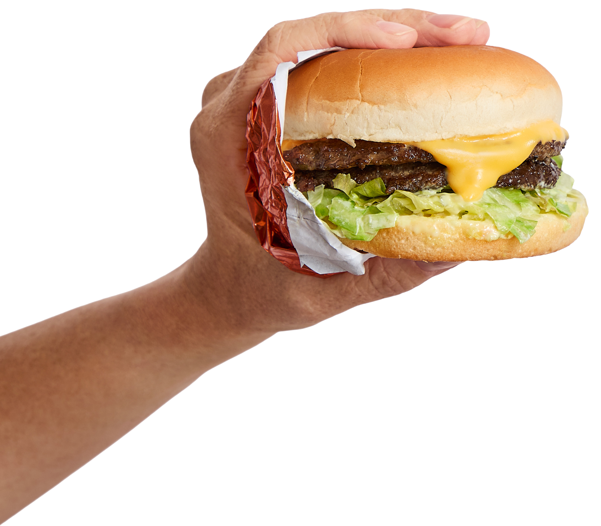 A hand holding a Deluxe: a burger with lettuce, two beef patties, melted cheese, and a hamburger bun.
