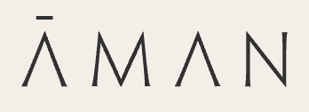 The word 'ÁMAN' written in black capital letters with diacritical marks on the A's.
