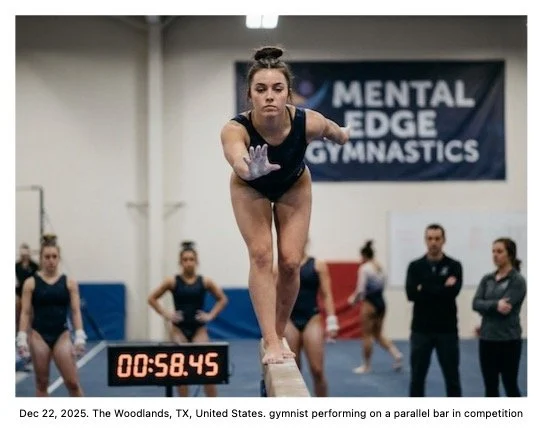A female gymnast balancing on a parallel bar during a competition in a gymnasium, with an audience and officials watching, and a digital timer showing 58.45 seconds.