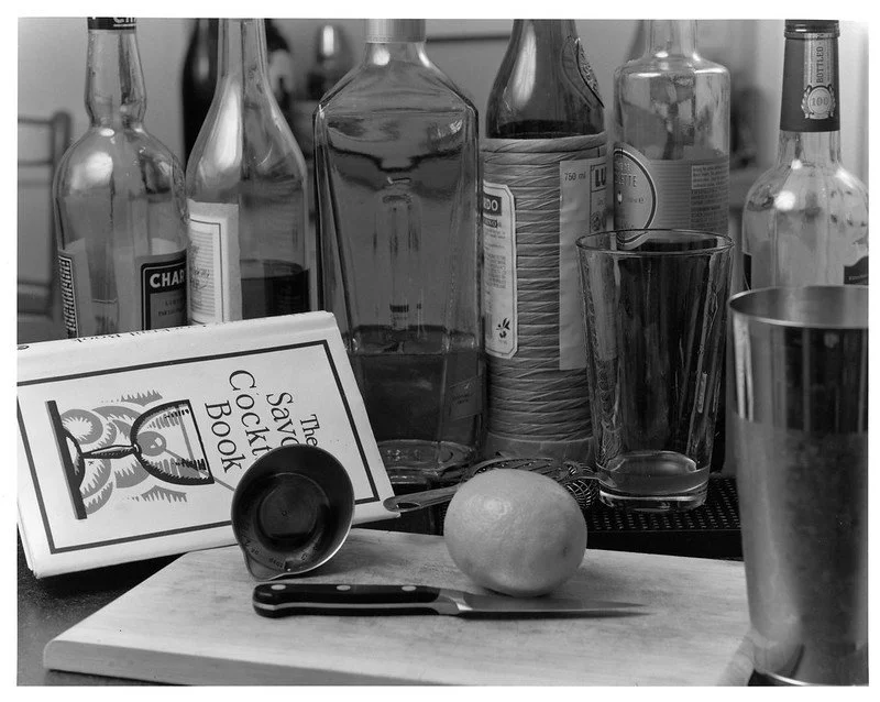silver gelatin photograph of a cocktail being made