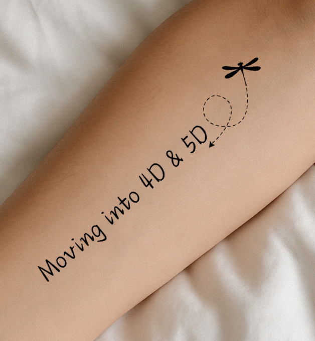 Inner aspect of the arm has a tattoo that says "I remember who I am". The background is a river and stones. 